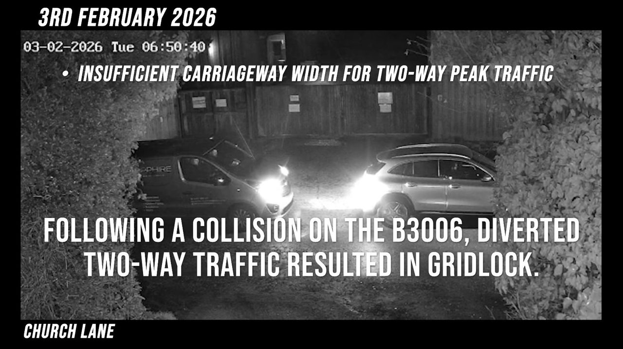 Night CCTV on Church Lane, 06:50 on 3 February 2026: a van and a car meeting head-on on a narrow lane with no room to pass.
